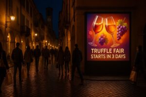 Wine tourism DOOH billboard in Alba showing animated countdown for the truffle fair.